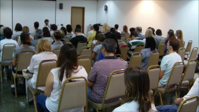 Join the course: a room full of students in a class with Flávio Duarte